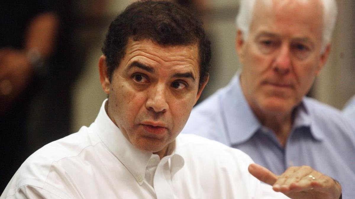 Rep. Henry Cuellar, D-Texas, left, along with Sen. John Cornyn, R-Texas, shown in this July 18, 2014, file photo, is the top Democratic recipient of oil and gas industry campaign donations in Congress. Cuellar says he votes in the interests of his district, not by ideology or special interest.