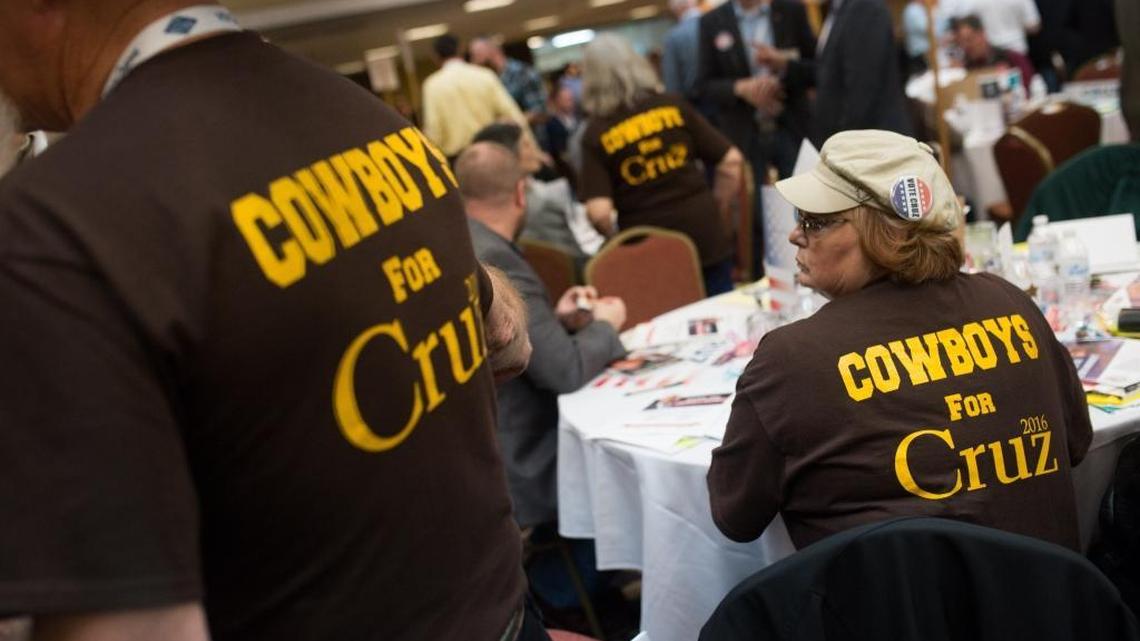 Supporters of Republican presidential candidate Sen. Ted Cruz wear "Cowboys for Cruz" T-shirts in the University of Wyoming colors during the Wyoming GOP Convention last week.