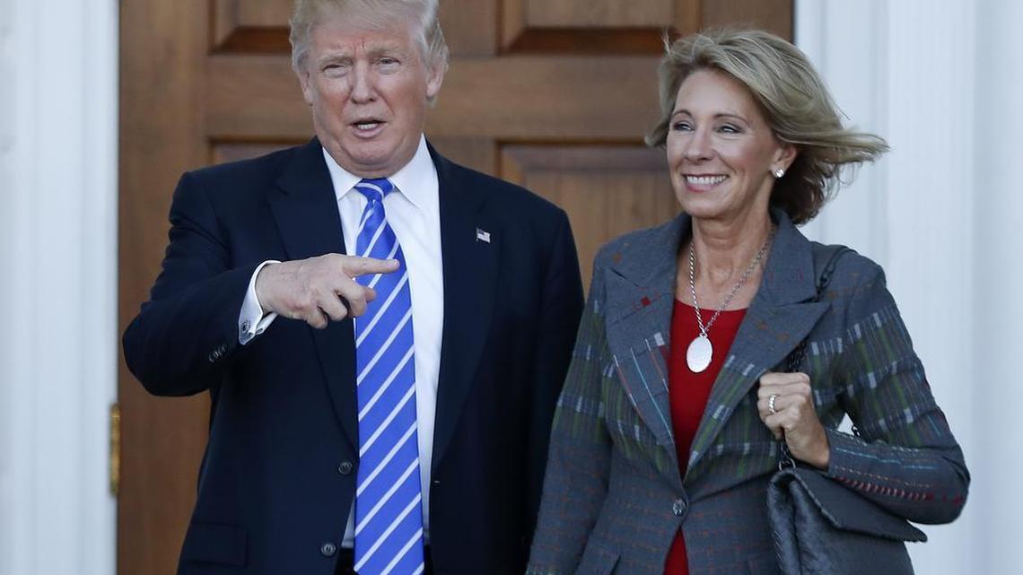 President-elect Donald Trump and Betsy DeVos are pictured at Trump National Golf Club Bedminster clubhouse in Bedminster, N.J., on Nov. 19, 2016.