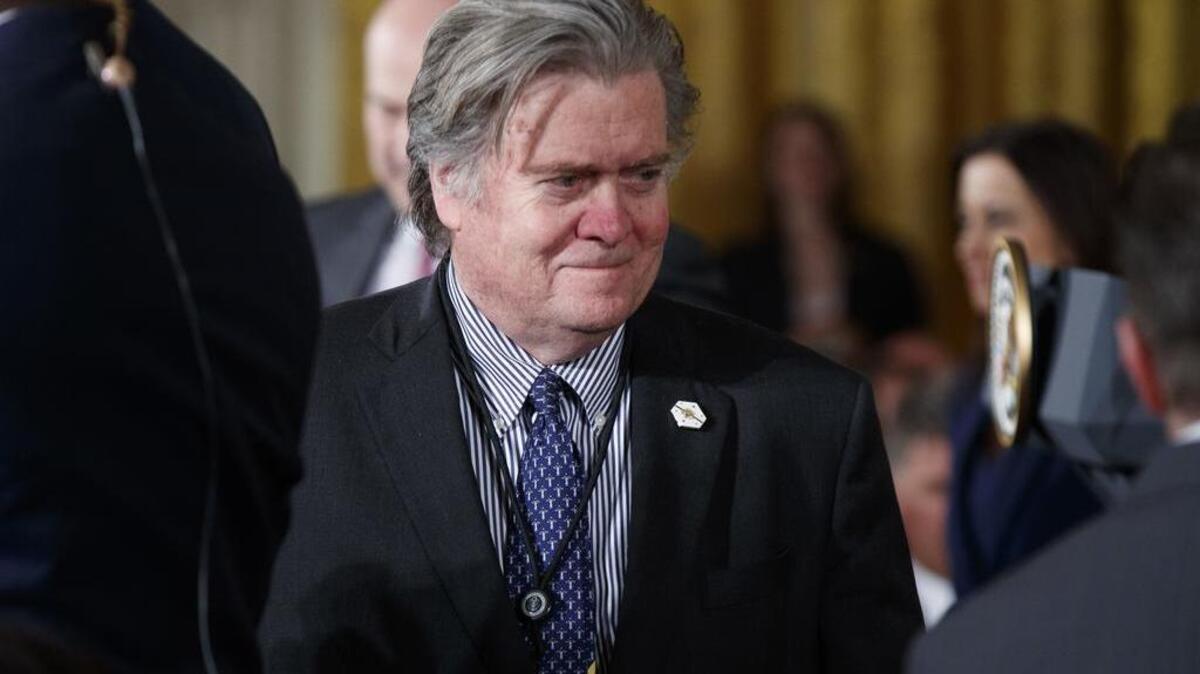 White House chief strategist Steve Bannon leaves the East Room of the White House in Washington.