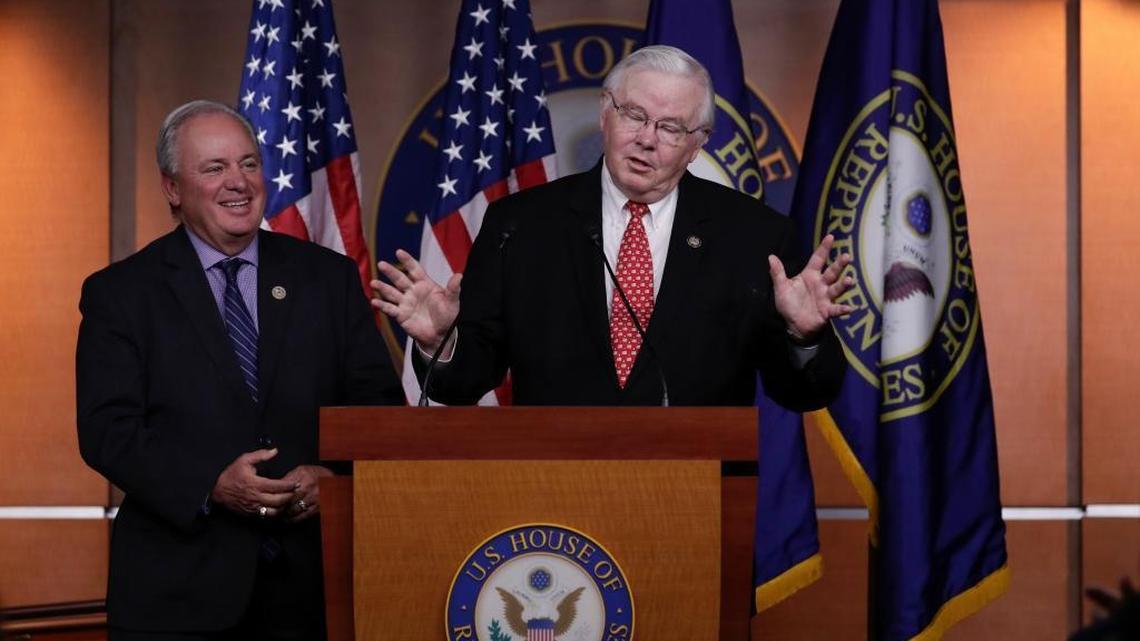 Rep. Mike Doyle, D-Pa., left and Rep. Joe Barton, R-Texas meet with reporters on Capitol Hill in Washington.