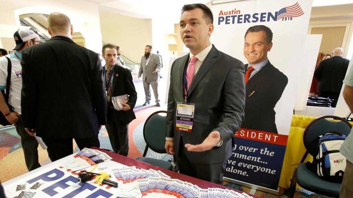 Libertarian presidential candidate Austin Petersen, center, speaks to delegates at the National Libertarian Party Convention last year.