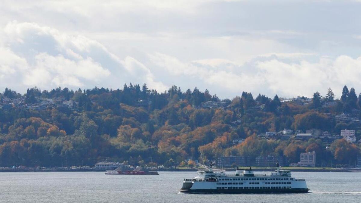 Washington state’s top political leaders fear that President Trump’s first budget could jeopardize federal funding for plans to clean up Puget Sound, one of the nation's largest estuaries. Here, a Washington state ferry sails on Elliott Bay near West Seattle.