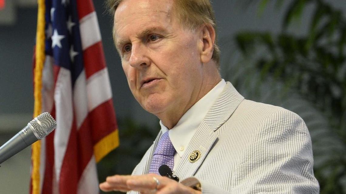 U.S. Rep. Robert Pittenger plans to file for re-election Friday in a newly drawn district, even as a federal investigation of his former real estate company enters a second year. Here Congressman Robert Pittenger speaks at a town hall meeting in August.