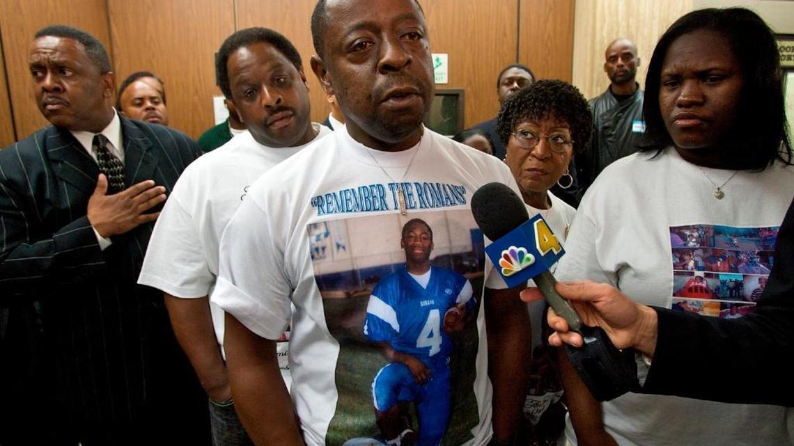 Jamiel Shaw Sr., center, and his wife, Army Sgt. Anita Shaw, far right, comment on the shooting death of their son Jamiel Shaw Jr., a 17-year-old Los Angeles High School football star. A 19-year-old reputed gang member who was in the country illegally was charged in the shooting.