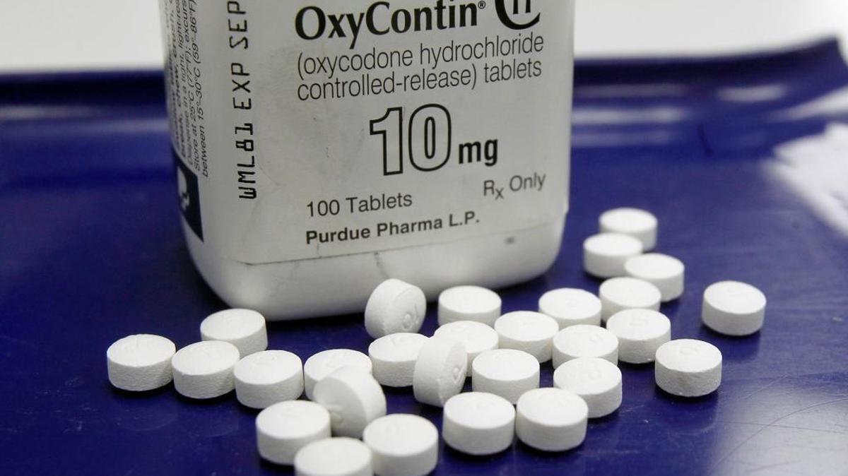OxyContin pills are arranged for a photo at a pharmacy in Montpelier, Vt. Less than three months after President Donald Trump declared the U.S. opioid crisis a public health emergency in October 2017, the nation's governors are calling on his administration and Congress to provide more money and coordination for the fight against the drugs.