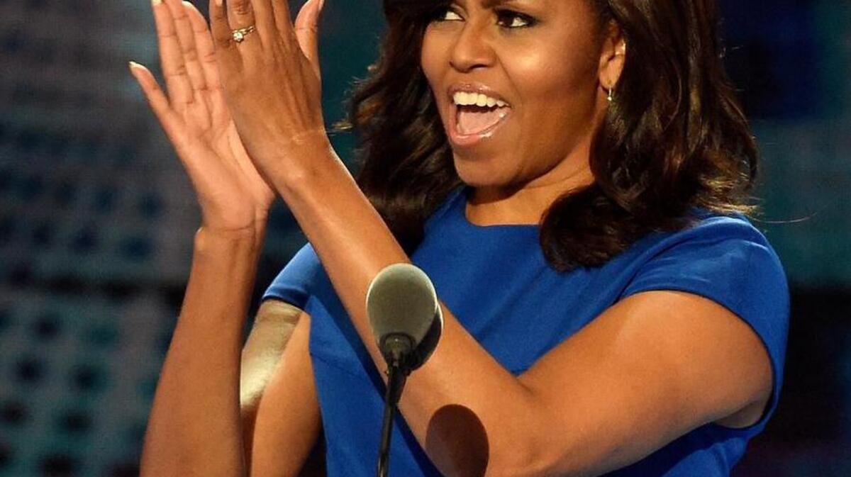 First lady Michelle Obama applauds during the Democratic National Convention on July 25, 2016, at the Wells Fargo Center in Philadelphia. Next week at the White House she’ll honor the recipients of the 2016 National Arts and Humanities Youth Program Award.