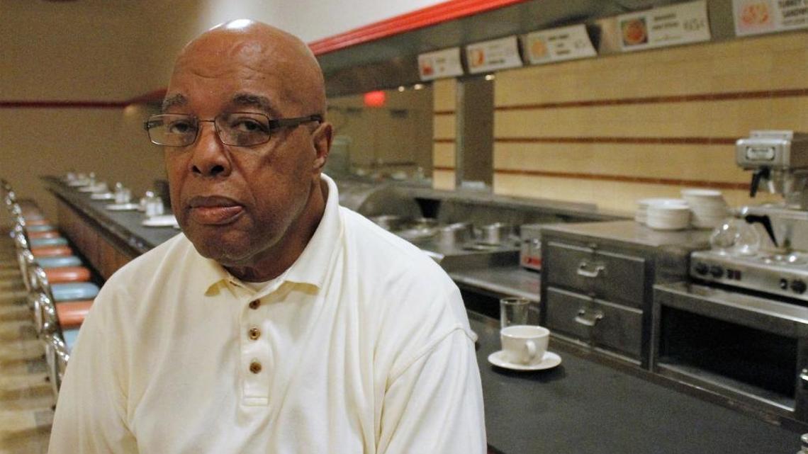 Clarence Henderson sits at the Woolworth’s lunch counter in Greensboro, NC, on Sept. 16, 2016, more than 50 years after he and other students at North Carolina A&T State University staged a sit-in to protest the store’s policy of segregation at the lunch counter. After taking a stand then in the name of civil rights, Henderson has now come out in support of Republican presidential candidate Donald Trump.