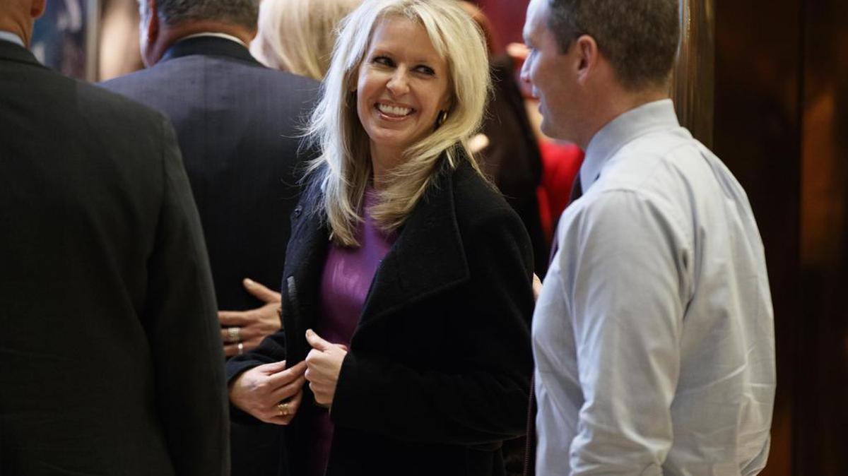 Monica Crowley smiles as she exits the elevator in the lobby of Trump Tower in New York, Thursday, Dec. 15, 2016. President-elect Donald Trump announced Crowley as senior director of Strategic Communications for the National Security Council.