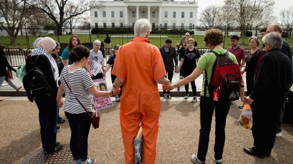 Protesters gathered outside the White House earlier this month demanding the closure of the detention center at the U.S. Navy base at Guantánamo Bay, Cuba. On Wednesday, a senior Defense Department official told Congress that an unknown number of Americans had been killed because of detainee releases from the center.