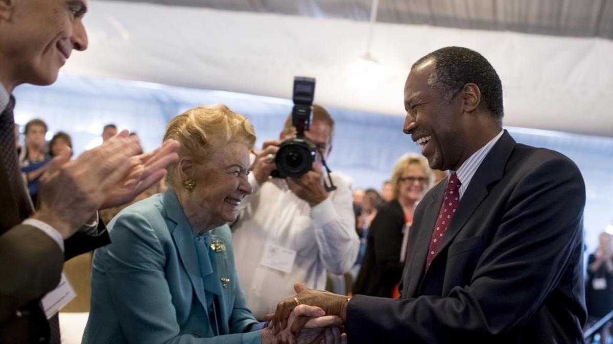 Phyllis Schlafly, founder of the Eagle Forum, greets former Republican presidential candidate Ben Carson in September. Schlafly, who later went on to endorse Donald Trump for the nomination, says she now faces a coup attempt within the Eagle Forum involving, among others, her son and daughter.