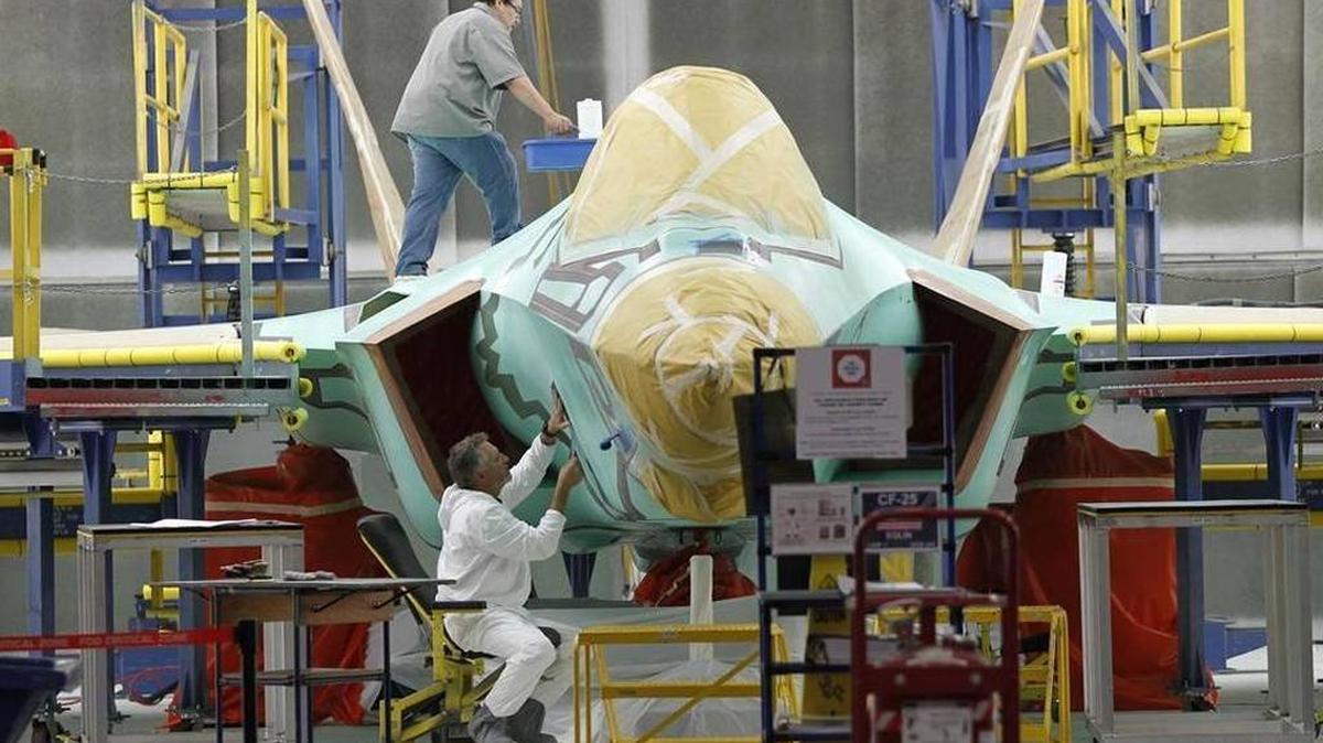 An F-35 is masked for the final finish coatings at Lockheed Martin Aeronautics in Fort Worth.