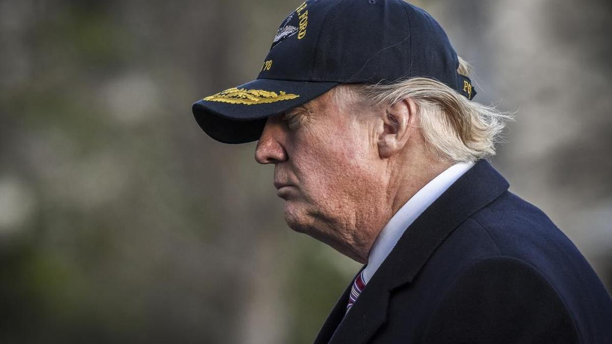 President Donald Trump arrives at the White House after a trip to Newport News, Va., to visit a new aircraft carrier on Thursday.