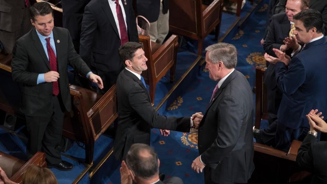 FILE – Republican House Speaker Paul Ryan of Wisconsin shakes hands with Rep. Mark Meadows, R-N.C., right, as Ryan is applauded following his re-election as speaker on Tuesday, Jan. 3, 2017. Meadows and the House Freedom Caucus met Monday night to decide the group’s stance on how and when to repeal and replace the Affordable Care Act, also known as Obamacare.
