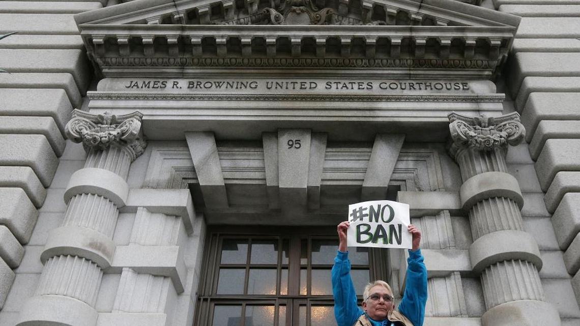 Karen Shore holds up a sign outside of the 9th U.S. Circuit Court of Appeals in San Francisco, Calif. in February.