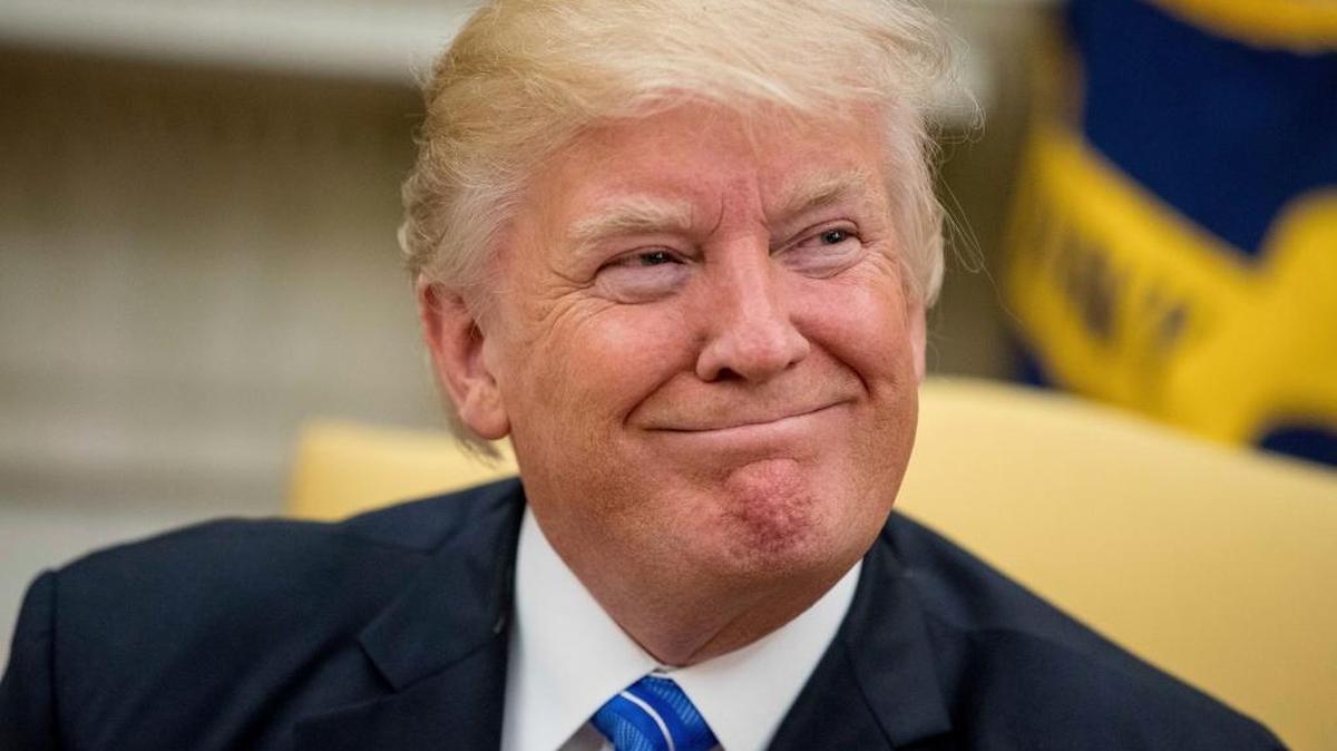 President Donald Trump smiles while meeting with Abu Dhabi's Crown Prince Sheikh Mohammed bin Zayed Al Nahyan on Monday in the Oval Office of the White House in Washington.