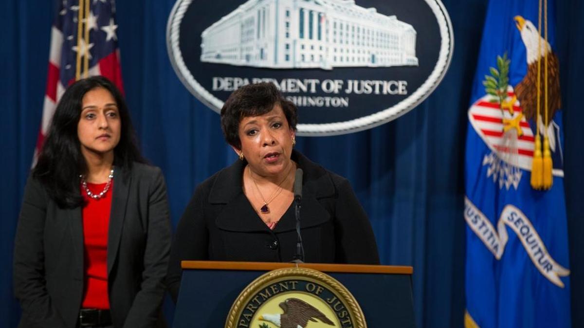Attorney General Loretta Lynch, accompanied by Vanita Gupta, head of the Justice Department's civil rights division, speaks during a news conference at the Justice Department in Washington, Monday, May 9, 2016.
