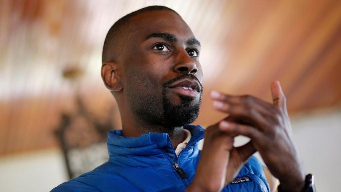 Baltimore mayoral candidate DeRay Mckesson chats with campaign volunteers before canvassing in Baltimore last year.