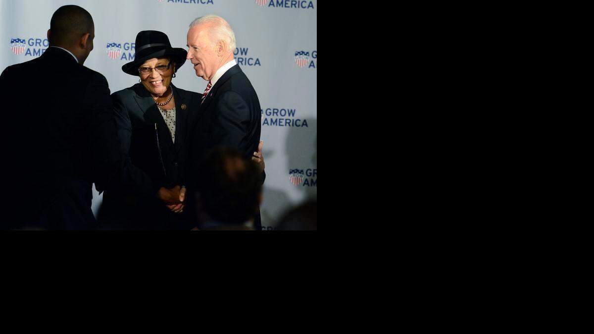 
N.C. Rep. Alma Adams hugs Vice President Joe Biden after his speech in Charlotte, N.C., Thursday, Feb. 19, 2015. Adams on Tuesday made sure that minority students and historically black colleges were included in a debate on how to improve the nation’s higher education system. 
