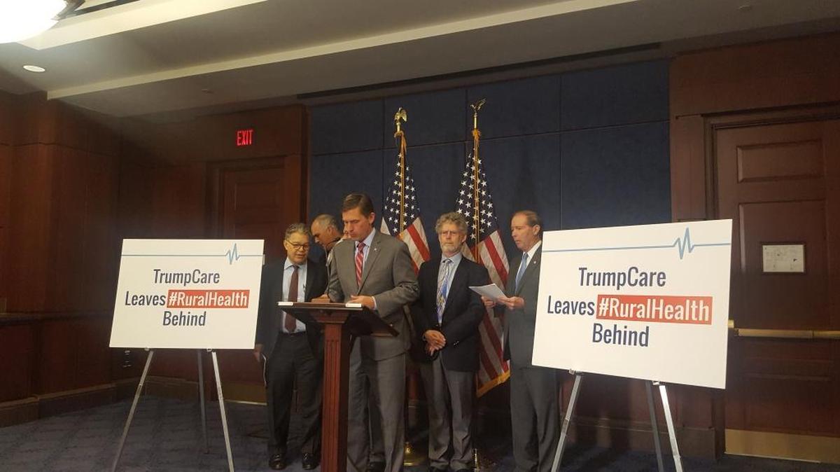 Democratic senators including Sen. Martin Heinrich of New Mexico, at the microphone, at a news conference Wednesday, May 24, 2017, about the impacts on rural health care of the Republican American Health Care Act. Sen. Bob Casey of Pennsylvania is shown to Heinrich’s immediate right.