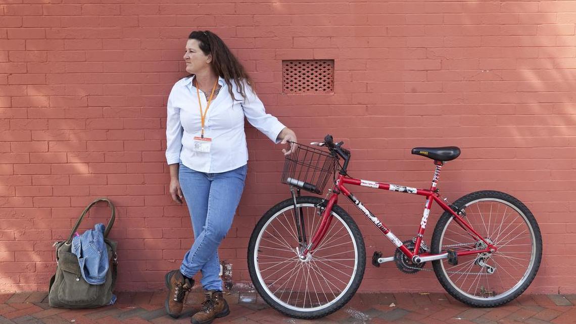 Tammie Hagen rests after working to register voters at the Third Street Bethel A.M.E. Church while the church was providing free lunches.