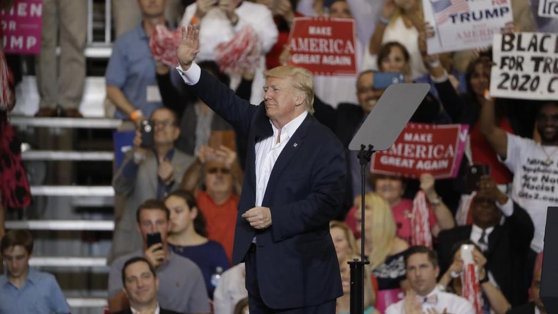 President Donald Trump during a campaign rally Saturday, Feb. 18, 2017, in Melbourne, Fla. Some of those who attended said that since the election, they have unfriended some of their liberal relatives or friends on Facebook.