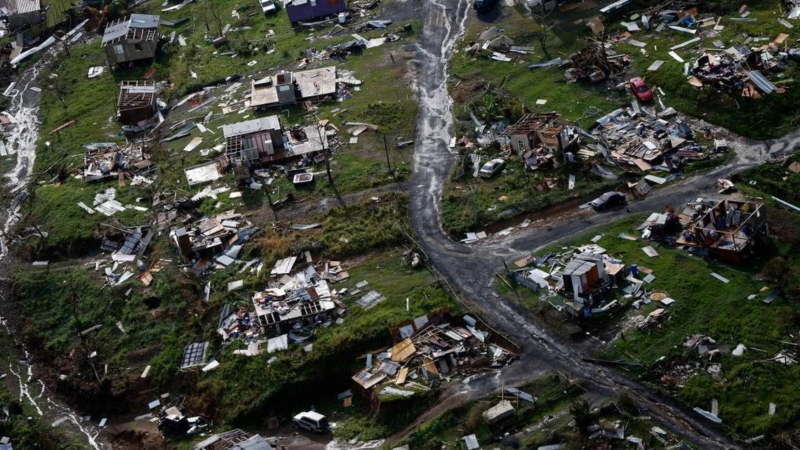 Destroyed communities are seen in the aftermath of Hurricane Maria in Toa Alta, Puerto Rico. Congress is on track to backing President Donald Trump's request for billions more in disaster aid.