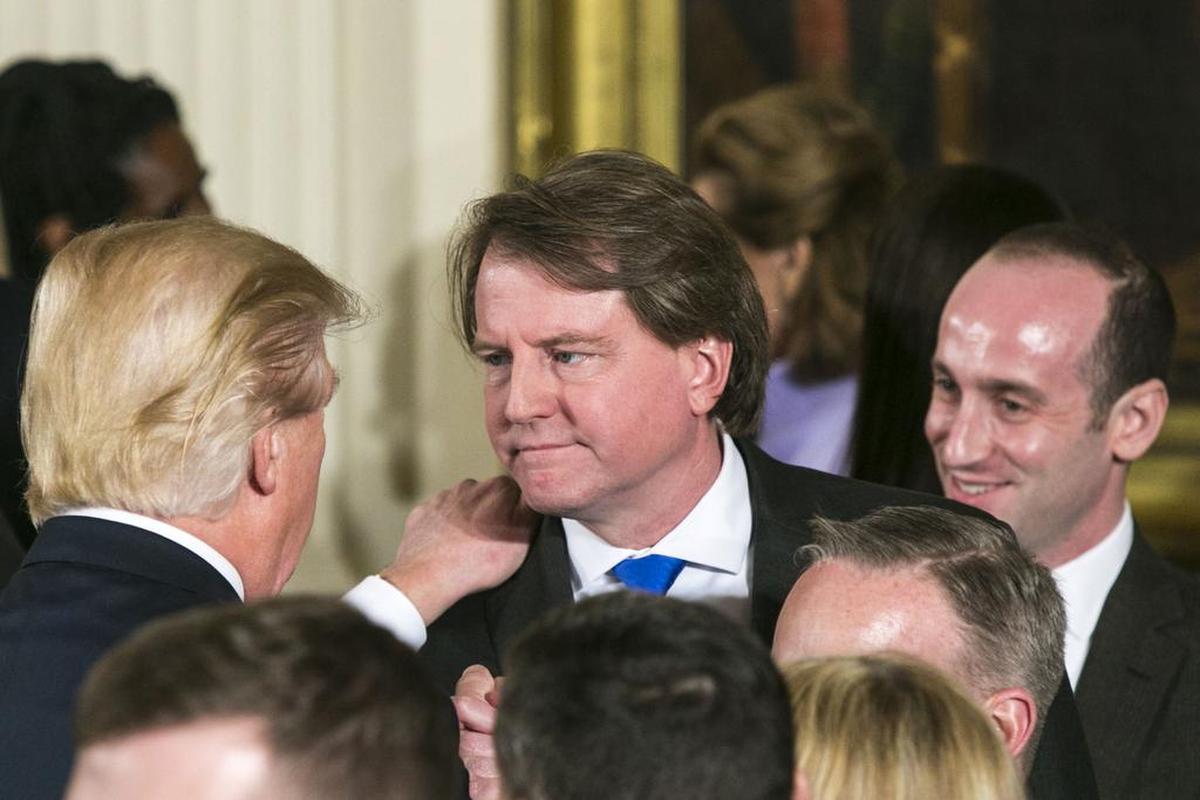 Donald McGahn, center, the White House counsel, told senior White House officials that firing Mueller would have a catastrophic effect on Trump’s presidency. McGahn also told White House officials that Trump would not follow through on the dismissal on his own. The president then backed off.