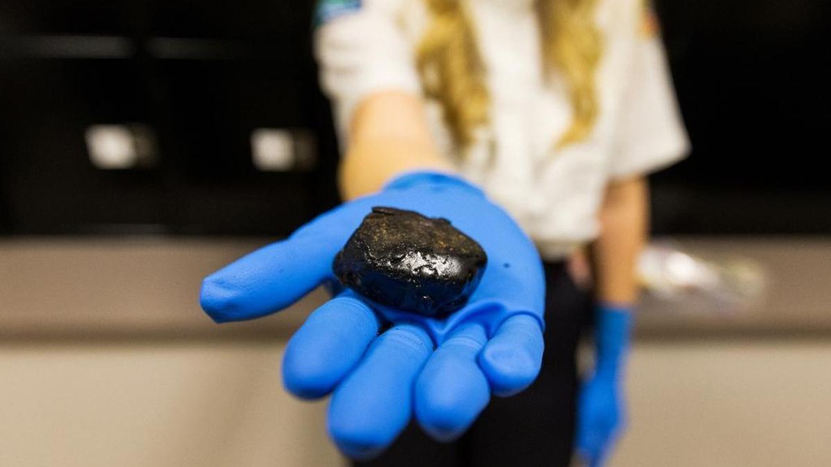 In this Jan. 27, 2016 photo, Post Falls, Idaho Police display a 40-gram chunk of black tar heroin with a street value of about $12,000. Republican Senate negotiators are considering $45 billion over ten years to fight heroin and opioid addiction. Health experts say more money is needed. (Shawn Gust /Coeur D'Alene Press via AP) MANDATORY CREDIT