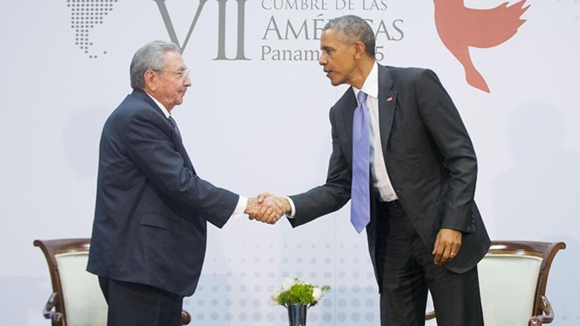 Barack Obama and Cuban President Raul Castro shook hands during their meeting at the Summit of the Americas in Panama City, Panama, in April 2015. Cuban officials recently have called on the United States to do more to discourage migration to the United States.