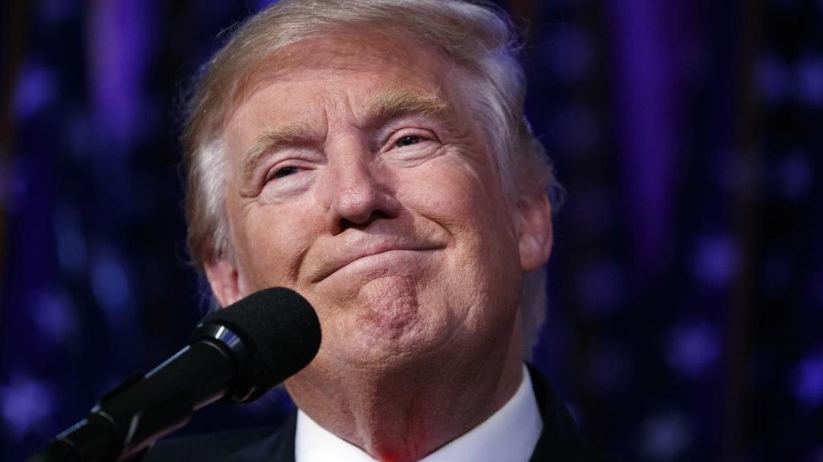 President-elect Donald Trump smiles as he arrives to speak at an election night rally, Wednesday, Nov. 9, 2016, in New York.