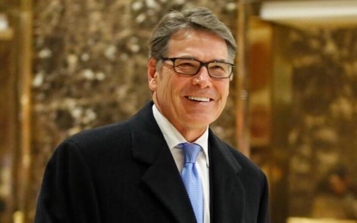 Former Texas Gov. Rick Perry smiles as he leaves Trump Tower in New York. Perry is President-elect Donald Trump’s likely choice to become energy secretary.