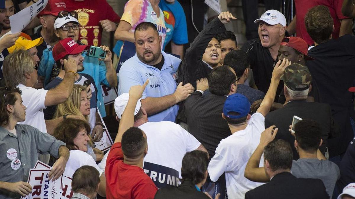 Protesters shout at Republican presidential candidate Donald Trump as he speaks during a campaign event in Orlando, Fla., on March 5.