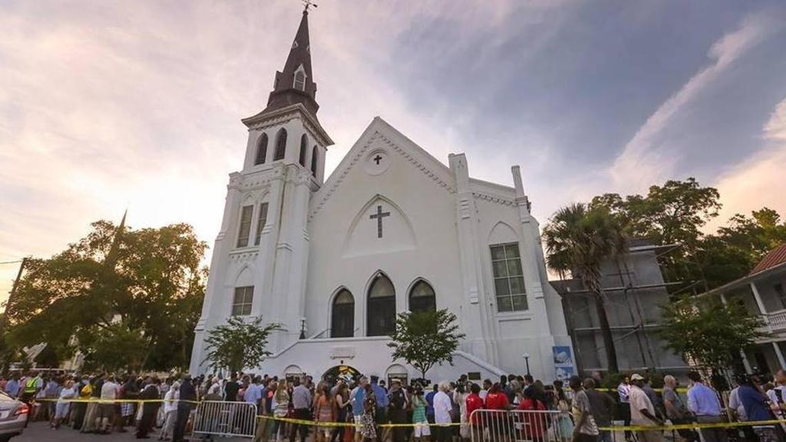 Mourners and well-wishers gather outside Charleston’s Emanuel AME Church in the days after last year’s shootings.