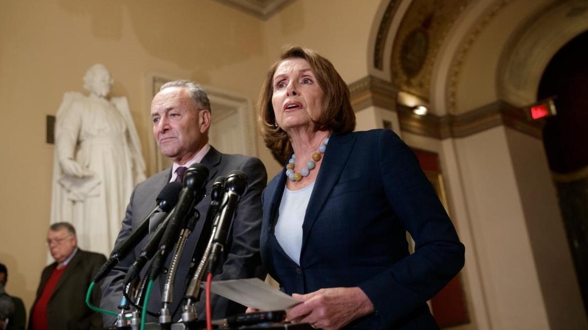 House Democratic leader Nancy Pelosi of California, and Senate Democratic leader Chuck Schumer of New York speak about the Congressional Budget Office projection that 14 million people would lose health coverage next year under the House Republican bill dismantling former President Barack Obama's health care law, on Capitol Hill in Washington, March 13, 2017.