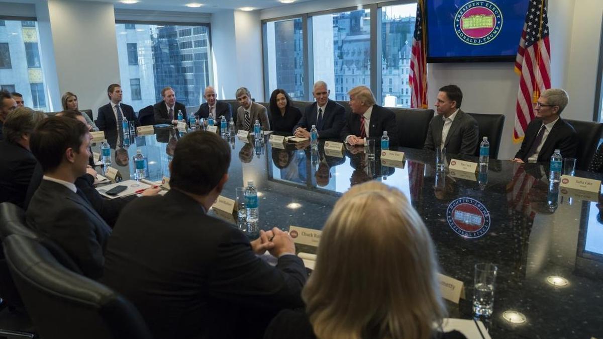 President-elect Donald Trump, Vice President-elect Mike Pence, cabinet nominees and technology company chiefs at a meeting in the Trump Organization conference room in December.