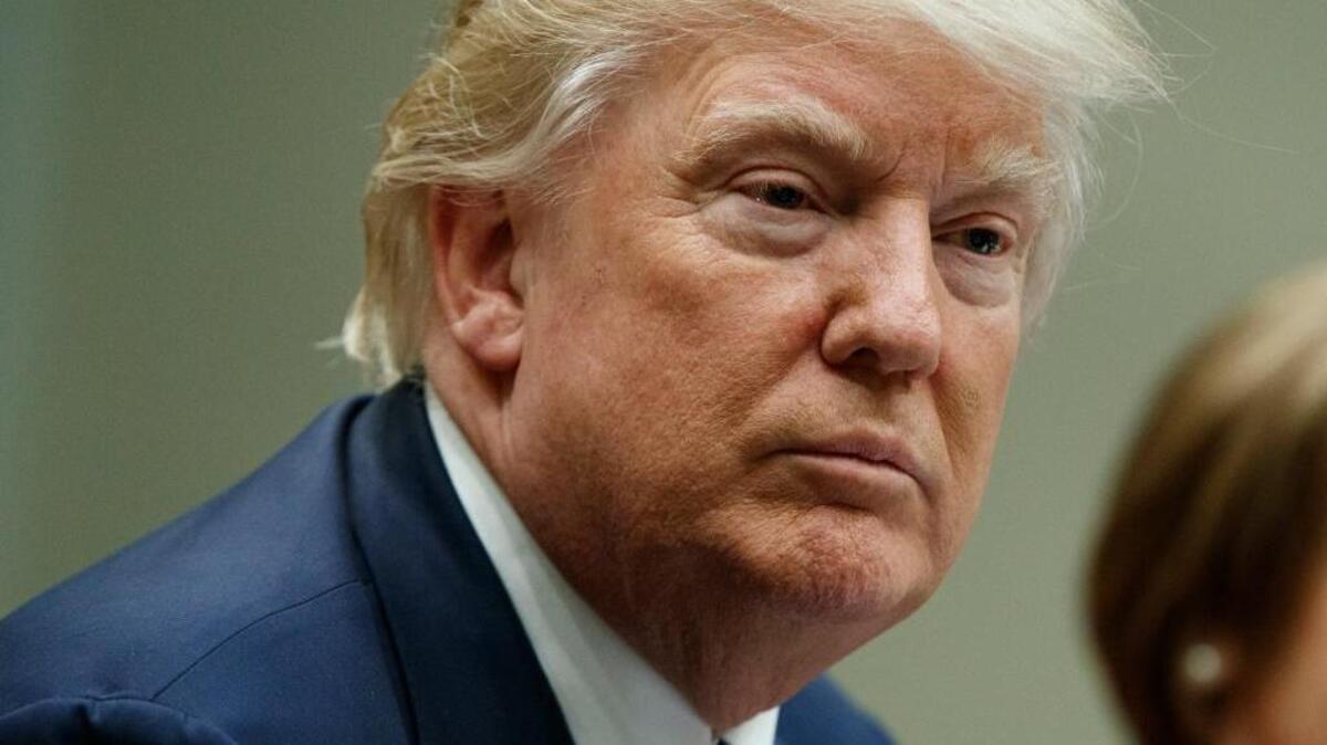 President Donald Trump listens during a meeting in the Roosevelt Room of the White House in Washington, Thursday, March 9, 2017. Before most people are out of bed, Trump is watching cable news. Indeed, with Twitter app at the ready, the man who condemns the media as “the enemy of the people” may be the most voracious consumer of news in modern presidential history.