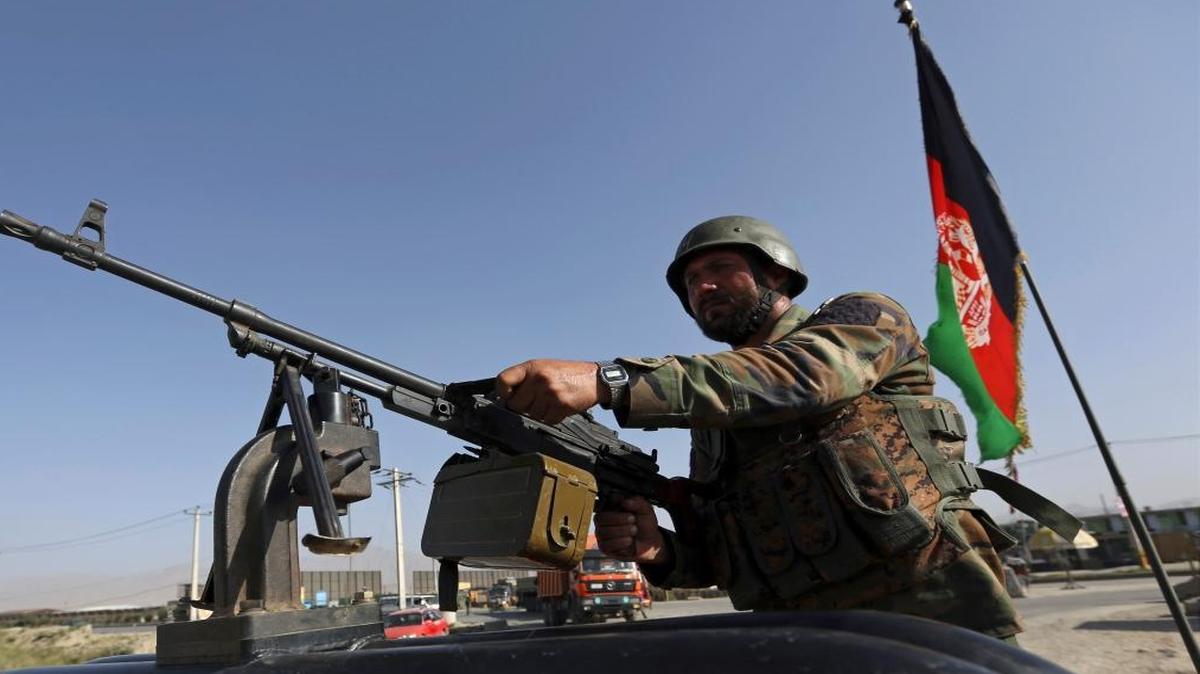 An Afghan National army soldier stands guard a checkpoint on the outskirts of Kabul, Afghanistan, Monday, Aug. 21, 2017. On Monday, President Donald Trump is planning to deliver his first formal address to the nation since taking office as he reveals to the nation his strategy for the war in Afghanistan.