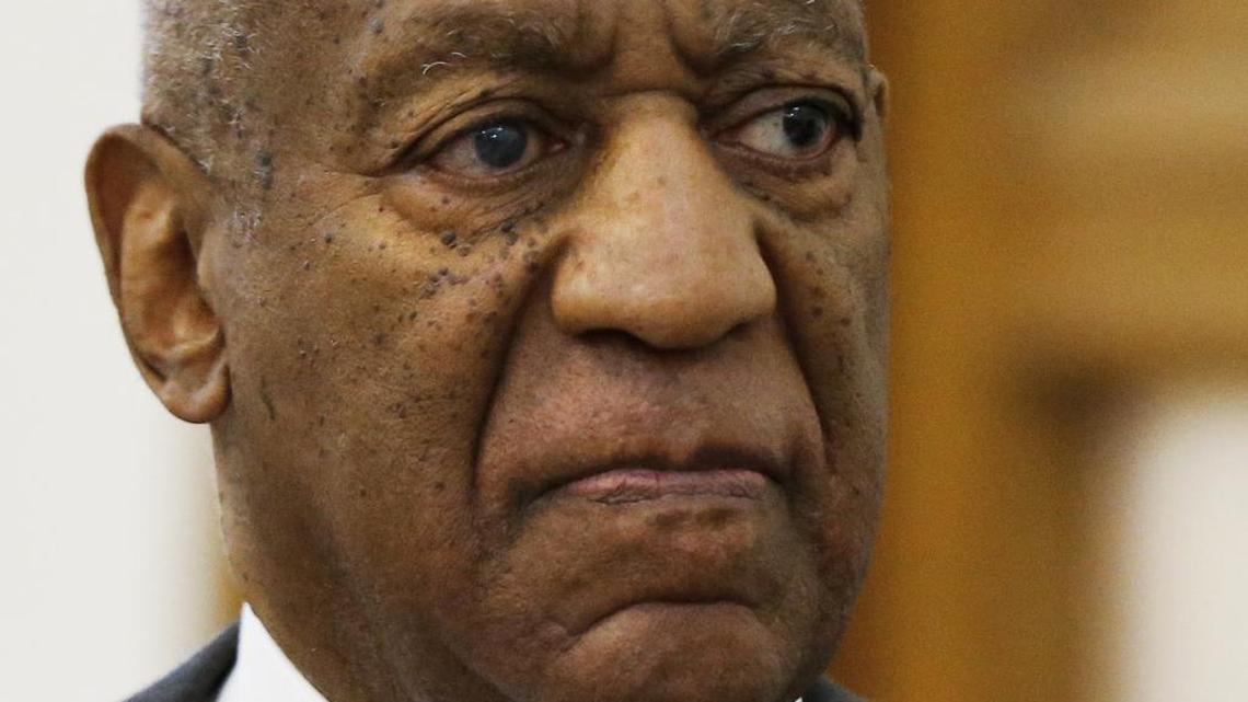 Bill Cosby was ordered to stand trial on sexual assault charges after a hearing that hinged on a decade-old police report in which a woman said the comedian gave her three blue pills that put her in a stupor, unable to stop his advances.