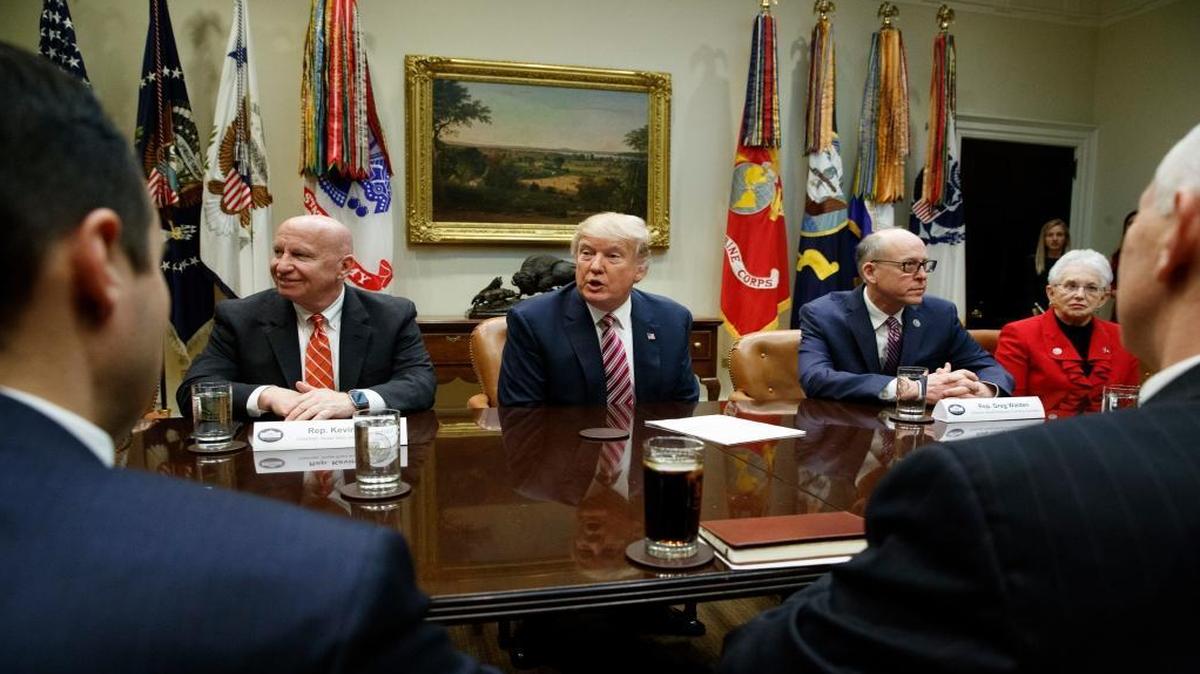President Donald Trump during a meeting on health care, Friday, March 10, 2017, in the Roosevelt Room of the White House in Washington. From left are, House Ways and Means Committee Chairman Rep. Kevin Brady, R-Texas, Trump, House Energy and Commerce Committee Chairman Rep. Greg Walden, R-Ore., and House Education and Workforce Committee Chairwoman Rep. Virginia Foxx, R-N.C.