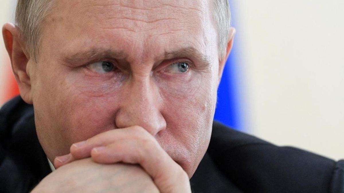Russian President Vladimir Putin attends a meeting with local officials after visiting a memorial for the victims of a fire in a multi-story shopping center in the Siberian city of Kemerovo, about 3,000 kilometers (1,900 miles) east of Moscow, Russia, Tuesday, March 27, 2018. Putin flew to the city of Kemerovo earlier on Tuesday to look at the investigation into the blaze that trapped dozens of parents and children who came to the entertainment center on Sunday on the first weekend of the school recess.