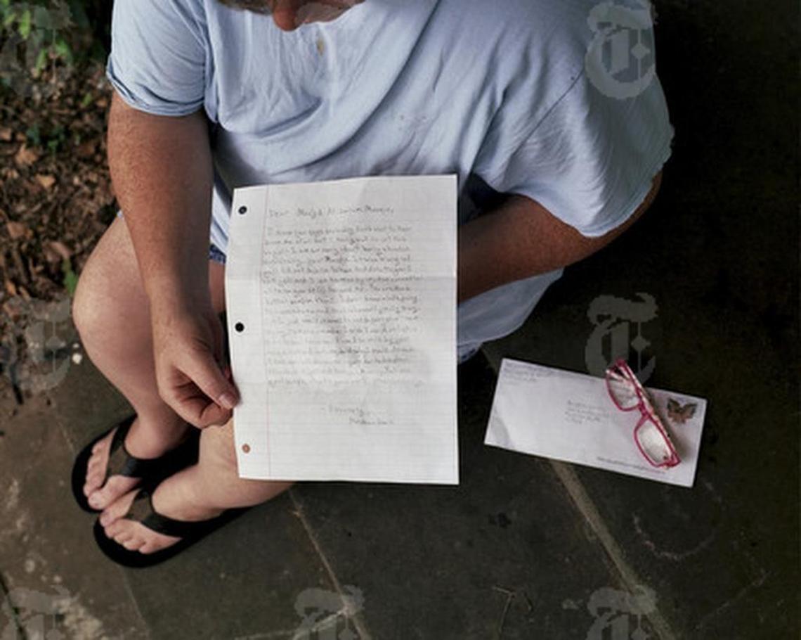 Kristin Collins holds the apology letter her son, Abraham Davis, wrote to Masjid Al Salam, a mosque in Fort Smith, Ark., that he had vandalized the year before, June 3, 2017. Senior members of the mosque forgave the offenders and fought to strongly oppose felony charges.