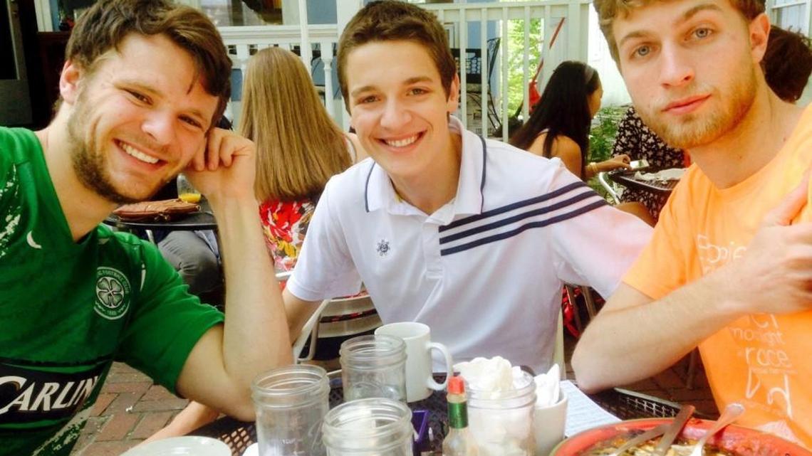 Otto Warmbier, left, with friends Emmett Saulnier, center, and Ned Ende in May 2015.