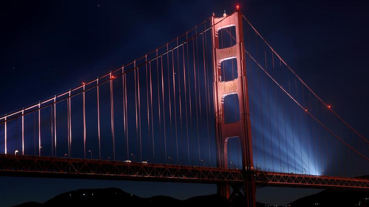 High-power lights illuminate the Golden Gate Bridge. Roughly 2,000 people have killed themselves by jumping off the bridge.