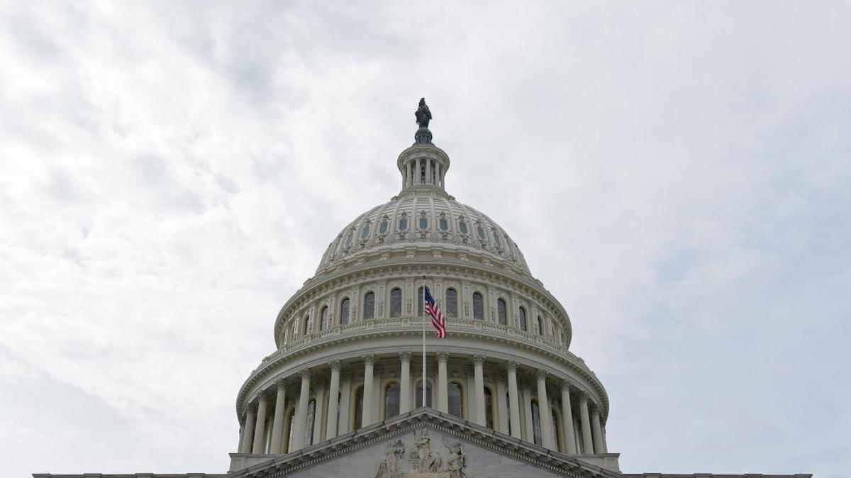 A flag flies on Capitol Hill in Washington, Feb. 28, 2017. Lawmakers returned to Washington this week to a familiar quagmire on health care legislation and a budget deadline dramatized by the prospect of a protracted battle between President Donald Trump and congressional Democrats over his border wall.