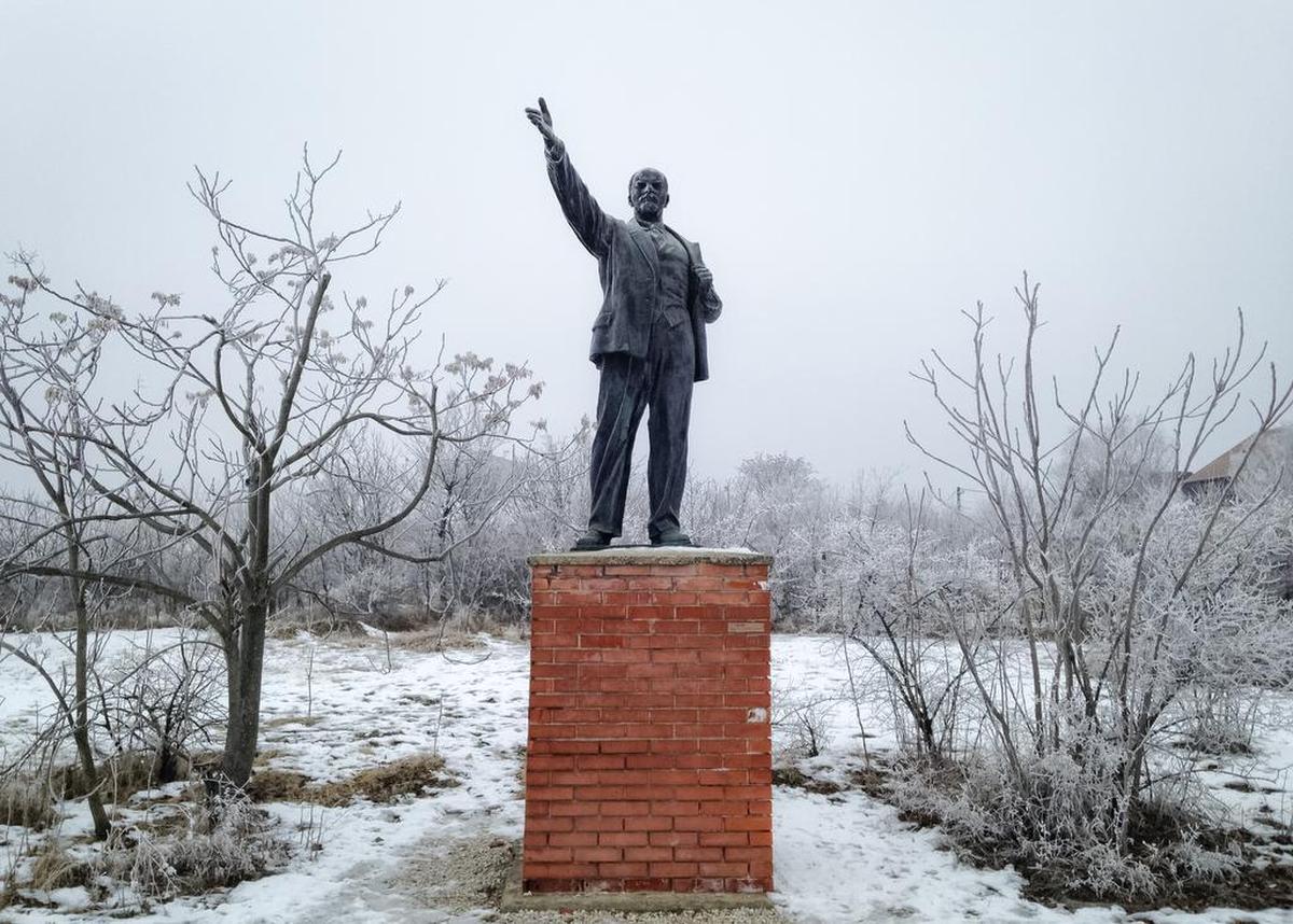 The bronze statue of Lenin at Memento Park in Budapest, Hungary, a museum exhibiting dozens of Socialist-era statues and monuments removed from the streets of Budapest after the fall of the communist regime.