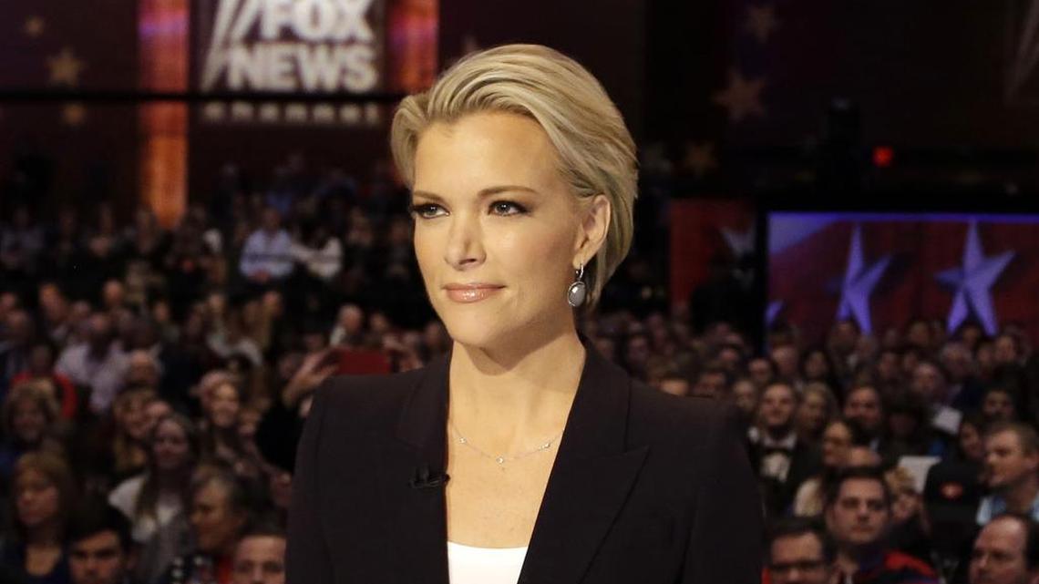 Megyn Kelly waits for the start of the Republican presidential primary debate in Des Moines, Iowa, Jan. 28, 2016.