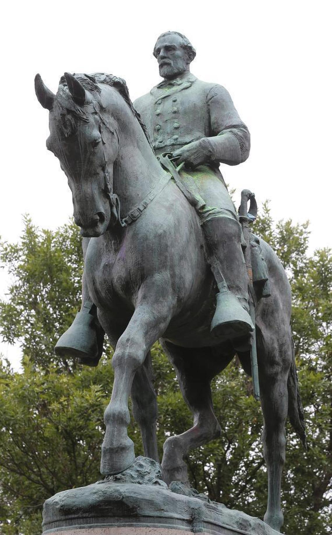 The statue of Confederate General Robert E. Lee still stands in Lee park in Charlottesville, Va., Monday, Aug. 14, 2017.