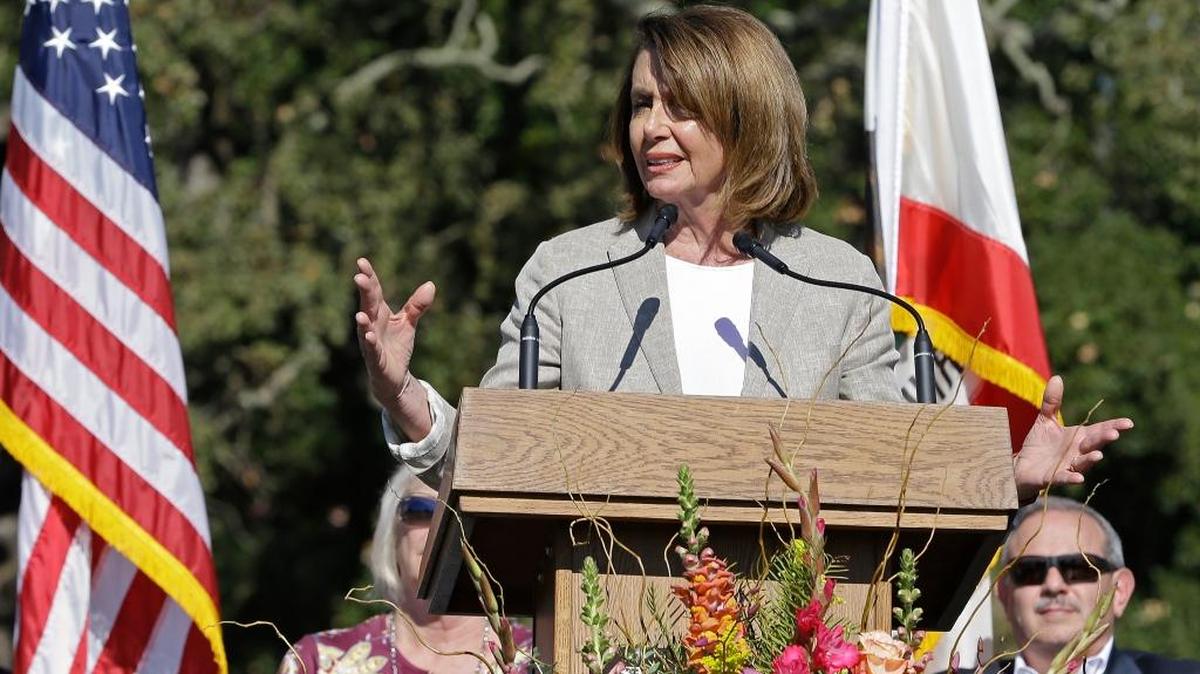 Minority Leader Nancy Pelosi, D-Calif., gestures while speaking during a Day of Remembrance memorial for victims of California wildfires on Saturday in Santa Rosa, Calif.