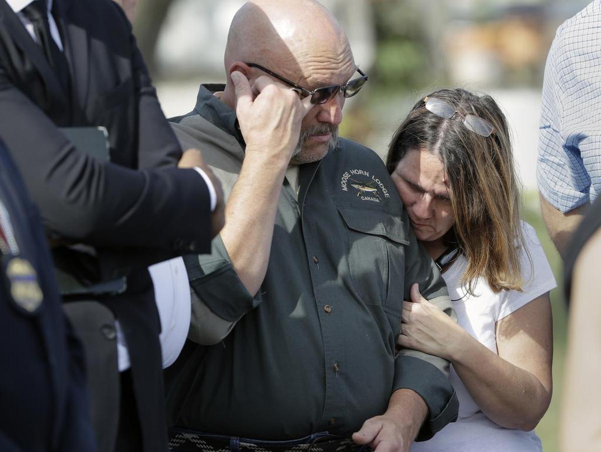 Pastor Frank Pomeroy and his wife Sherri join a news conference near the First Baptist Church of Sutherland Springs, Monday, Nov. 6, 2017, in Sutherland Springs, Texas. A man opened fire inside the church in the small South Texas community on Sunday, killing and wounding many. The Pomeroy's daugher, Annabelle, 14, was killed in the shooting.